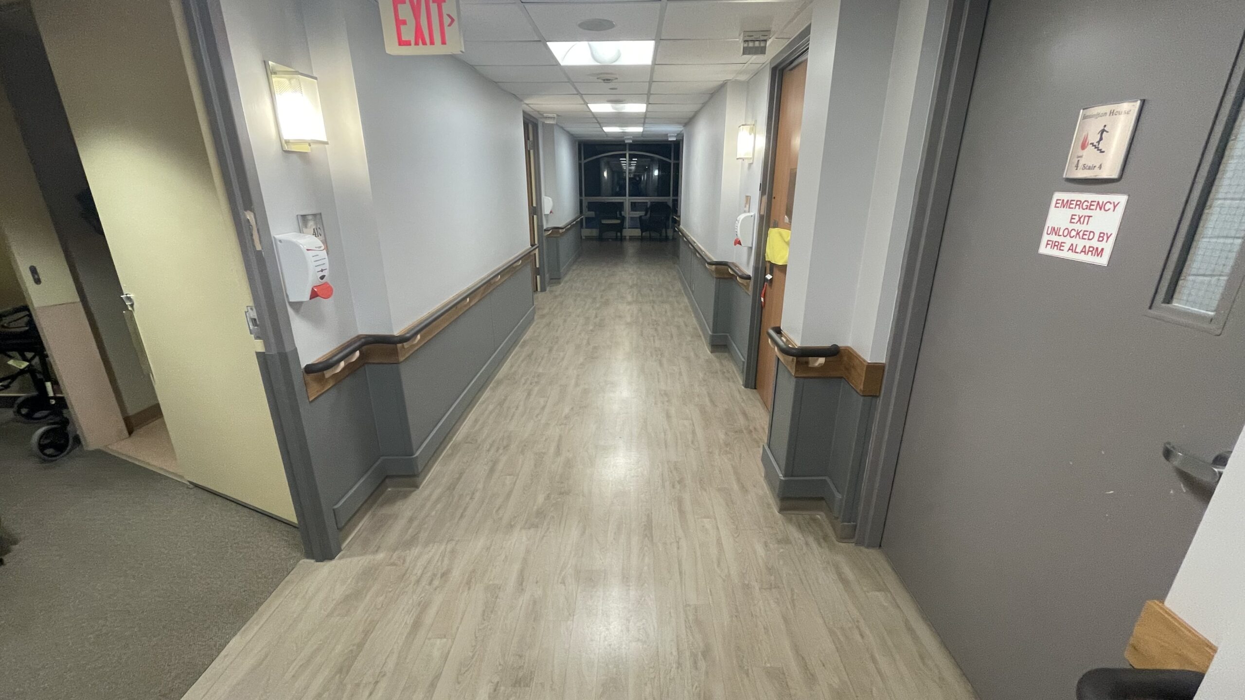 Long-term care corridor with handrails and wall protection – Victoria Village Manor, Barrie
